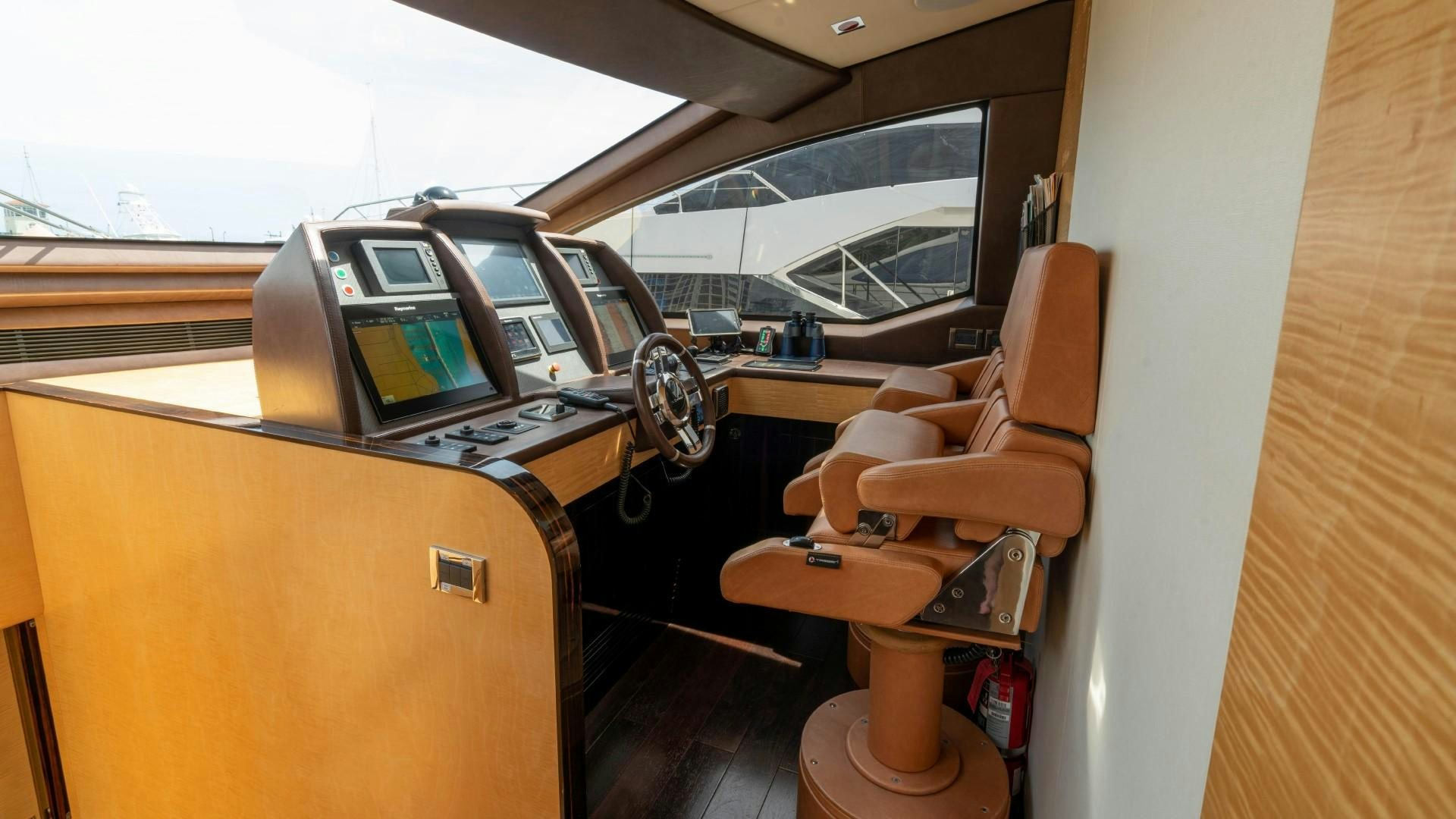 inside of a car aboard PHOENIX Yacht for Sale