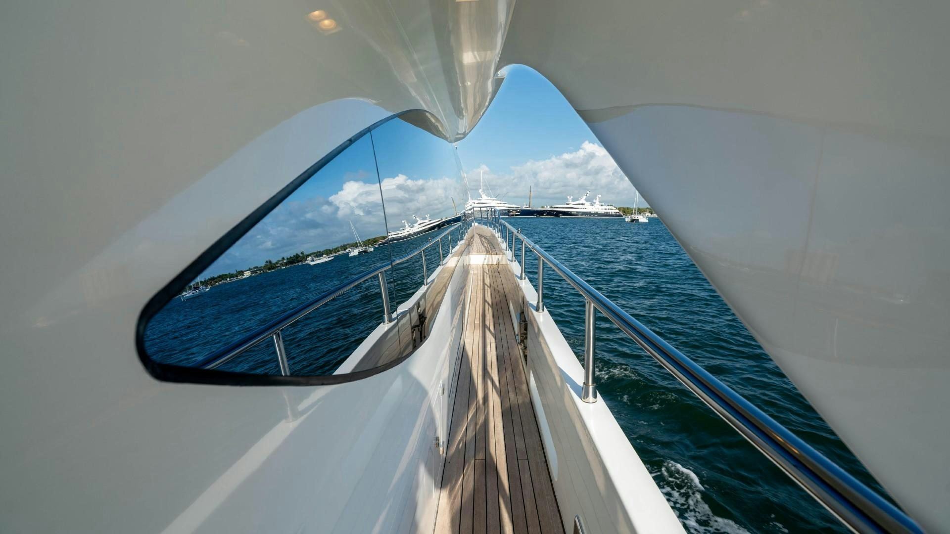 a large ship in the water aboard PHOENIX Yacht for Sale