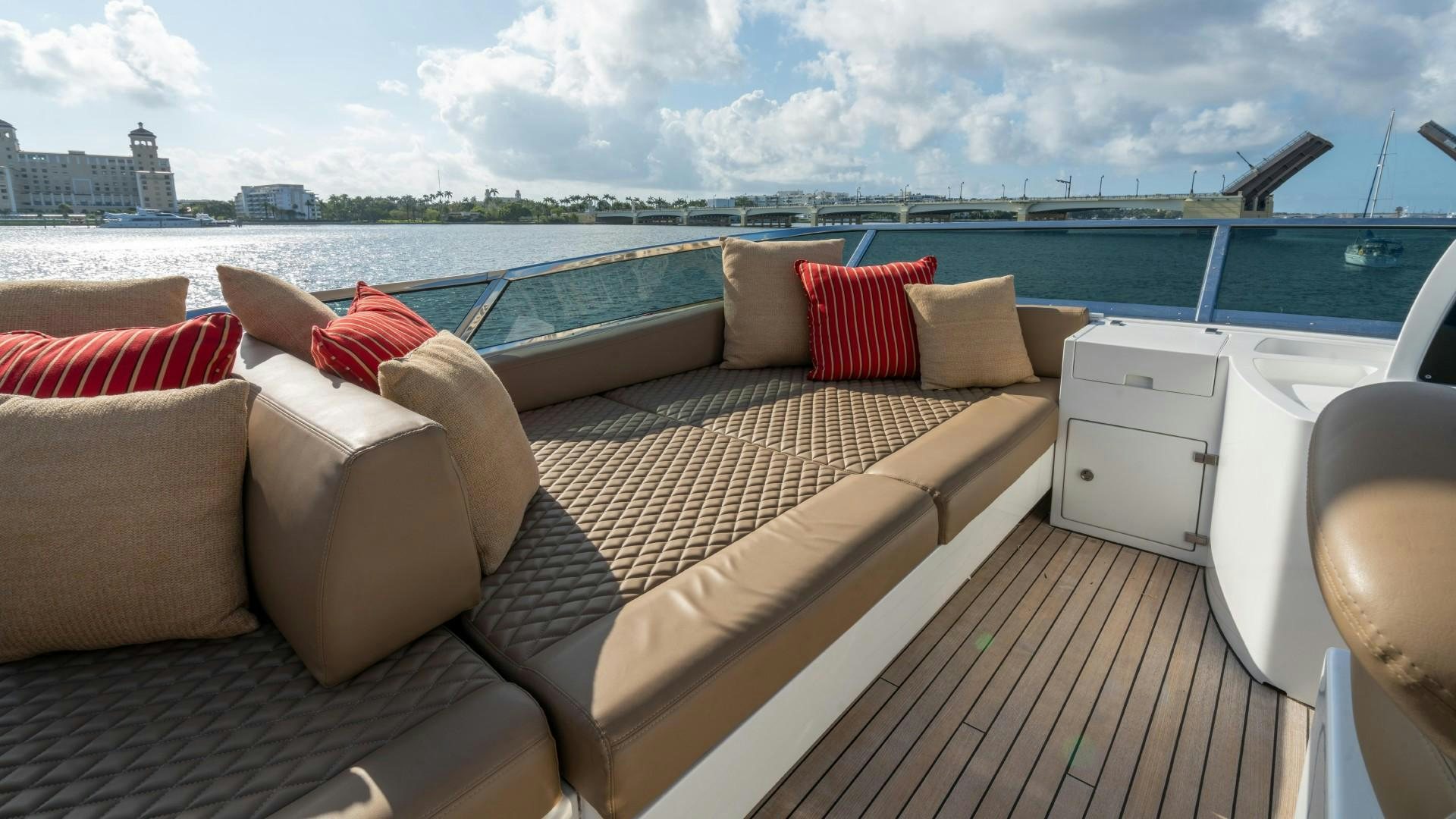a bed on a deck aboard PHOENIX Yacht for Sale