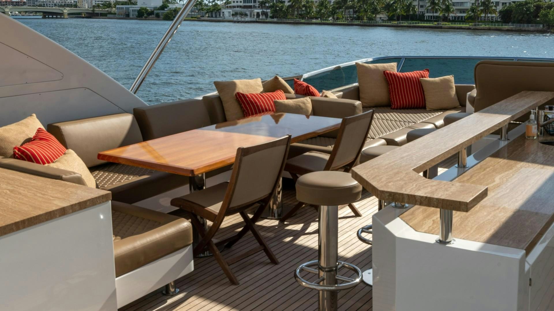 a table and chairs on a boat aboard PHOENIX Yacht for Sale