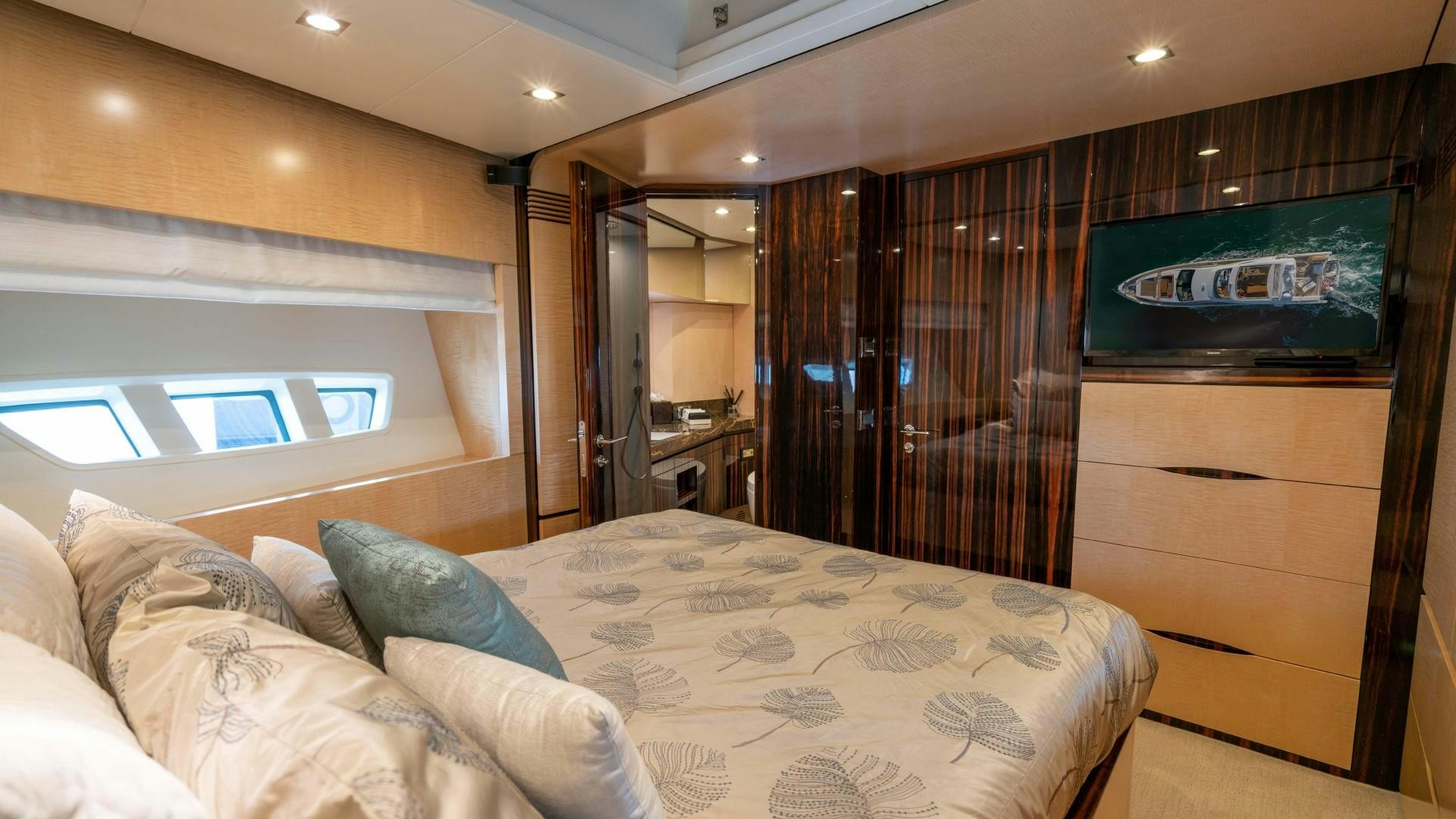 a bed in a room aboard PHOENIX Yacht for Sale
