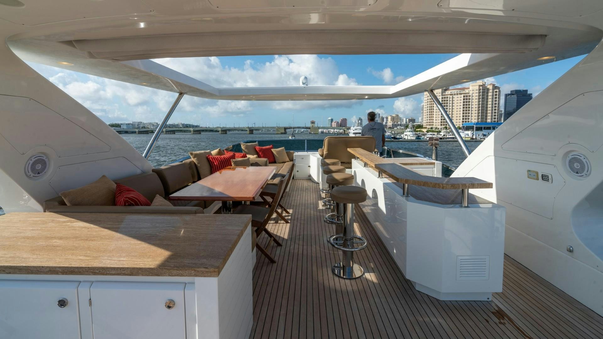 a room with a table and chairs aboard PHOENIX Yacht for Sale
