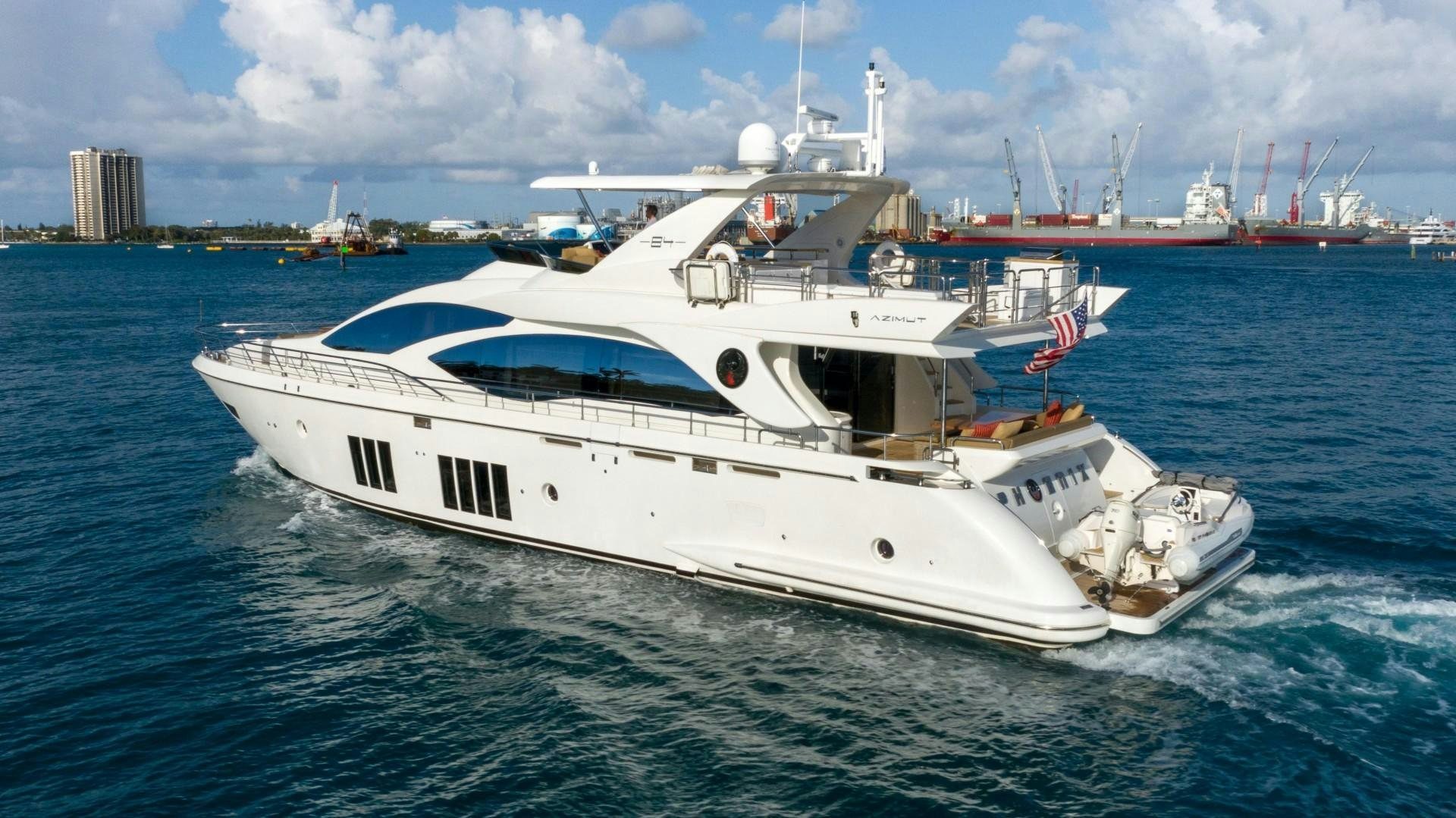 a white yacht in the water aboard PHOENIX Yacht for Sale