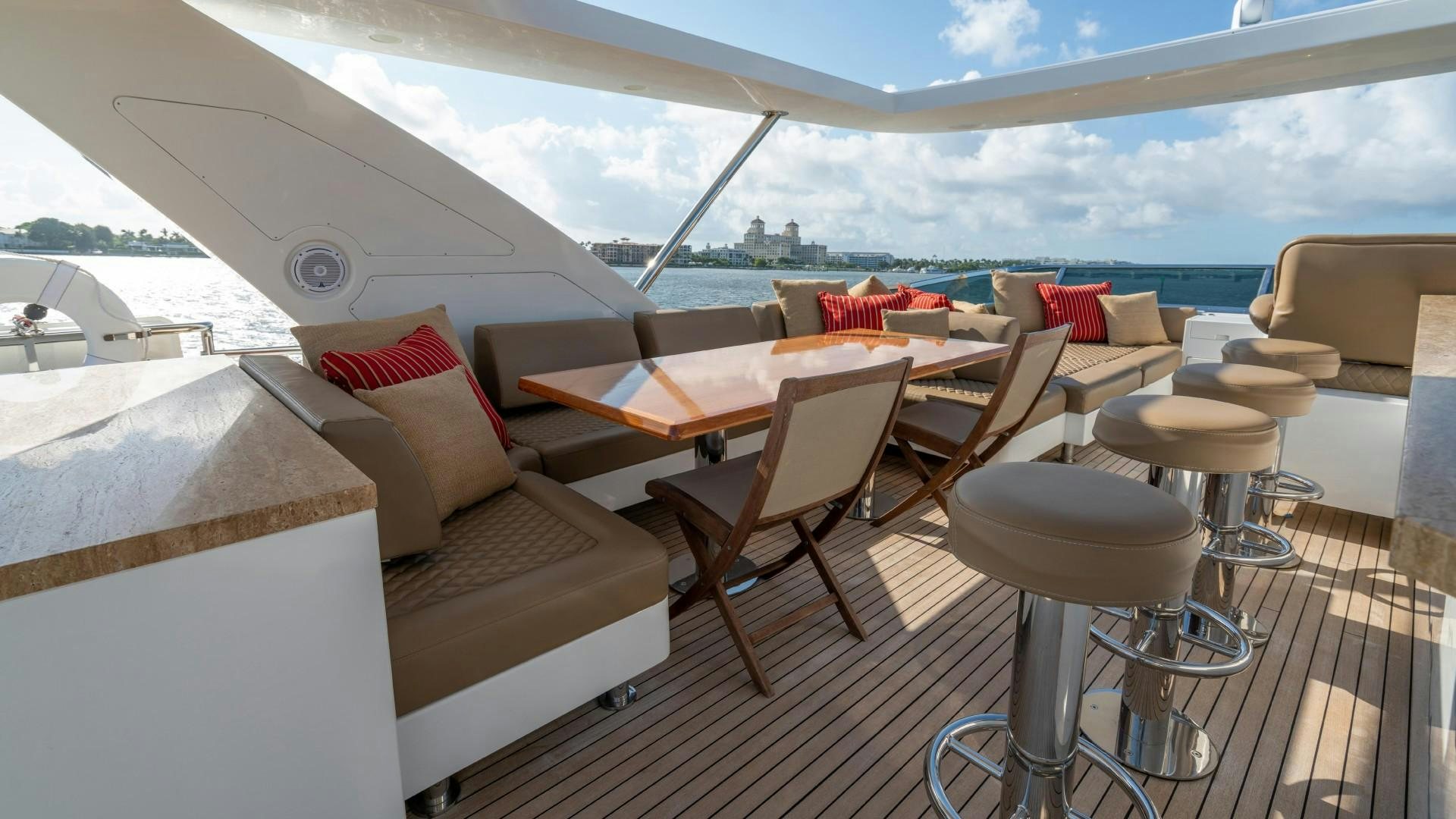a room with a table chairs and a large window aboard PHOENIX Yacht for Sale