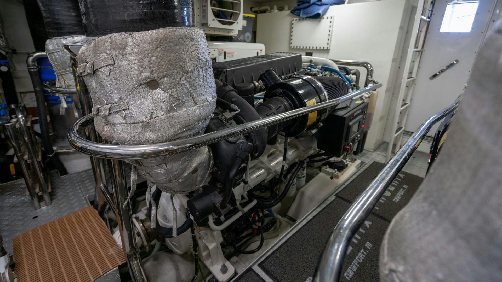 a machine with a large metal object on the back aboard PHOENIX Yacht for Sale