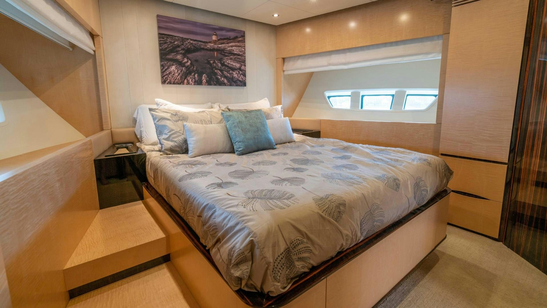 a bed in a room aboard PHOENIX Yacht for Sale