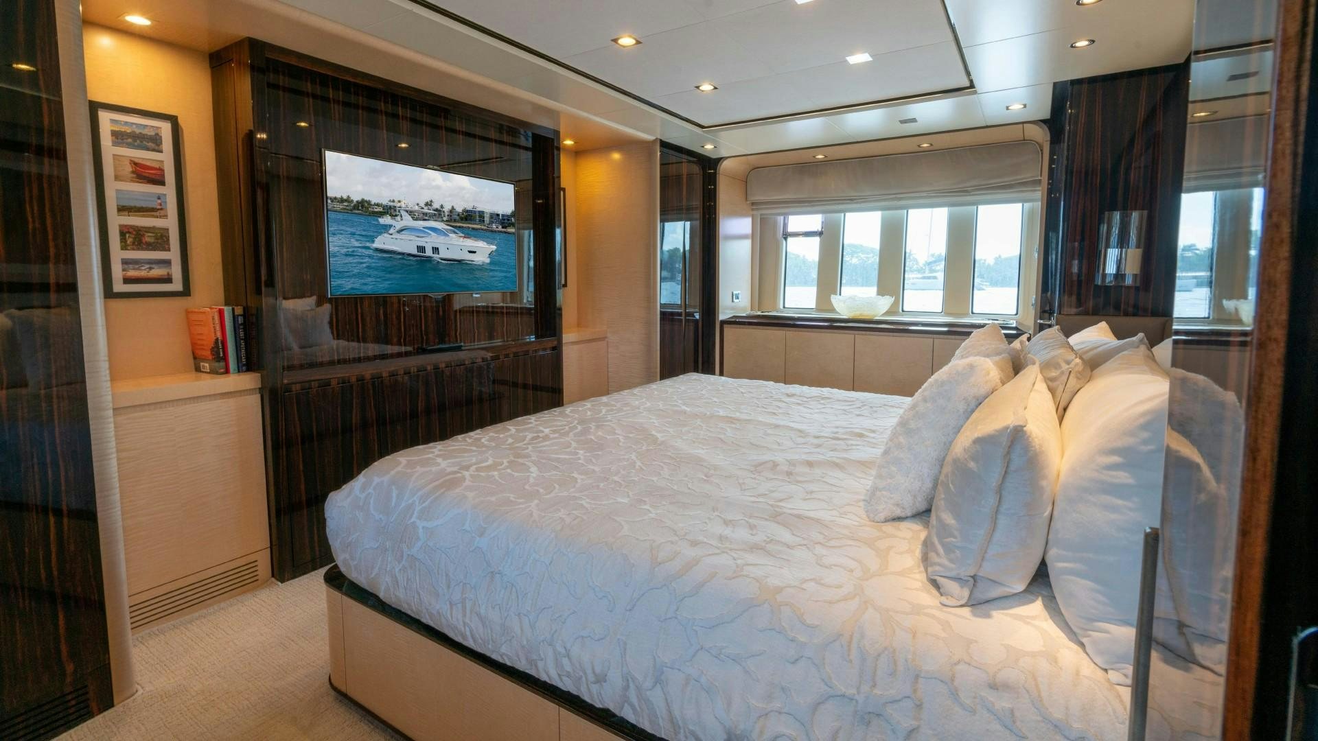 a bed in a room aboard PHOENIX Yacht for Sale
