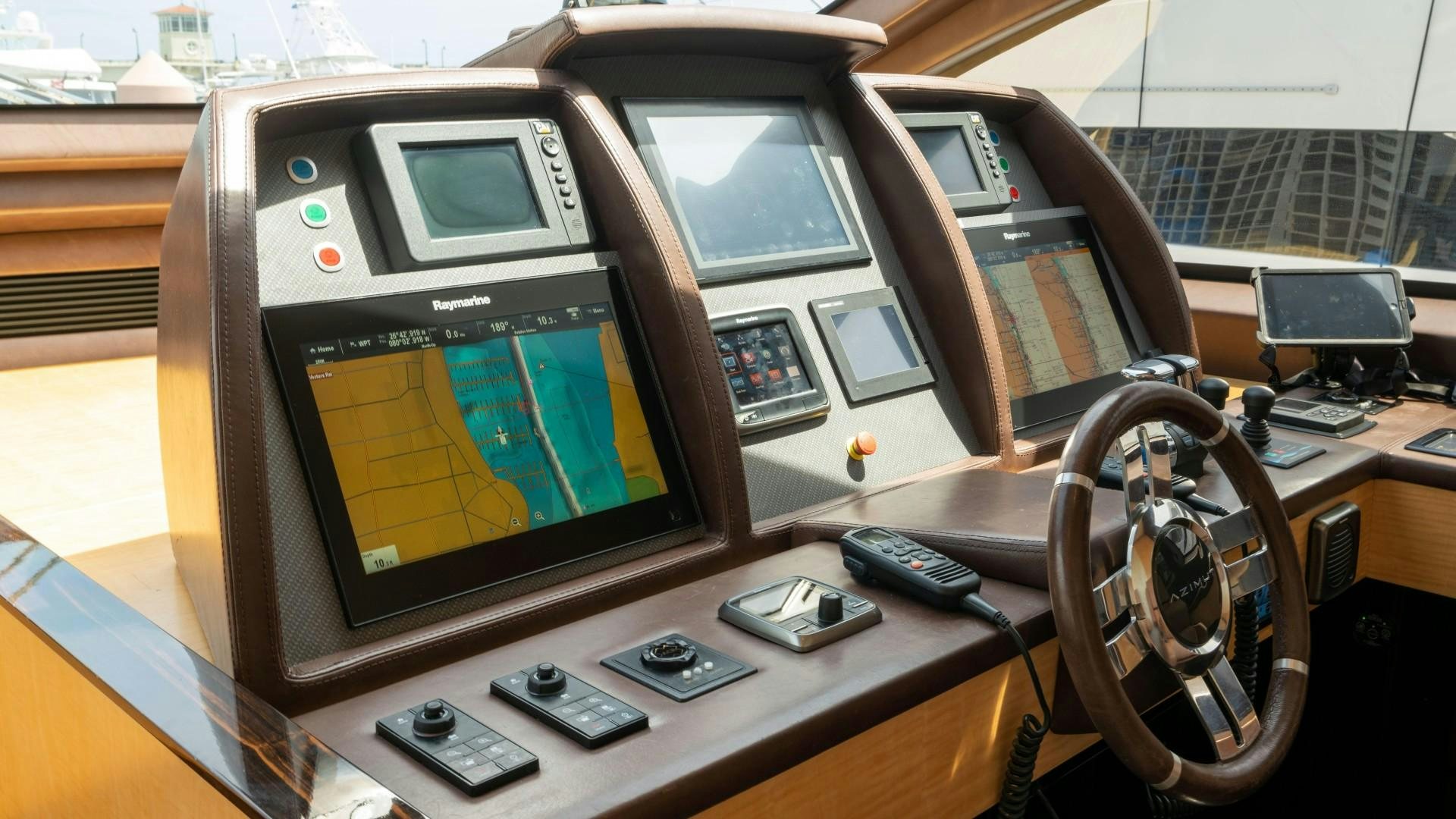 a computer with a screen and other electronic devices on it aboard PHOENIX Yacht for Sale