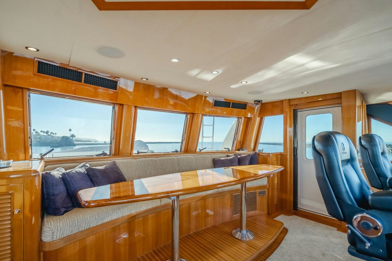 a bedroom with a large bed aboard OBSESSION Yacht for Sale