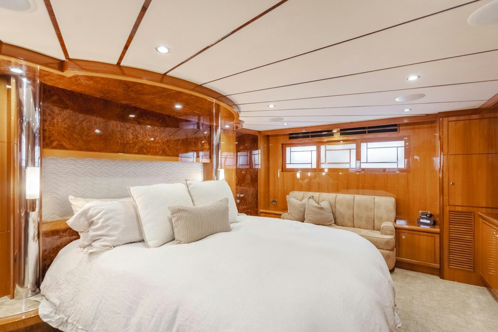 a bed in a room aboard OBSESSION Yacht for Sale