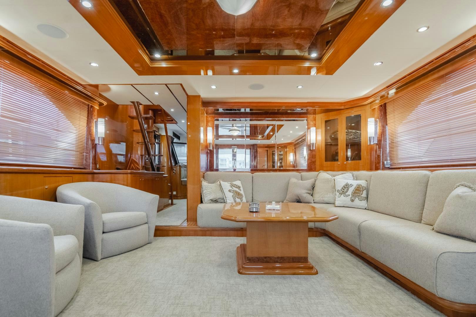 a living room with a large window aboard OBSESSION Yacht for Sale