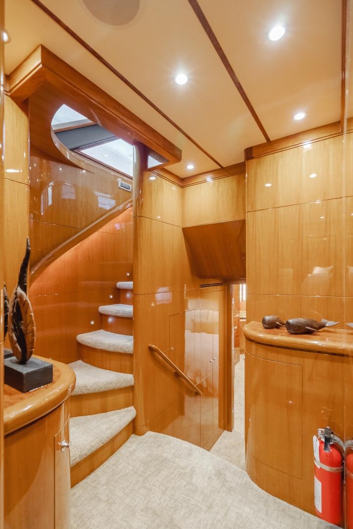 a bathroom with wooden walls aboard OBSESSION Yacht for Sale