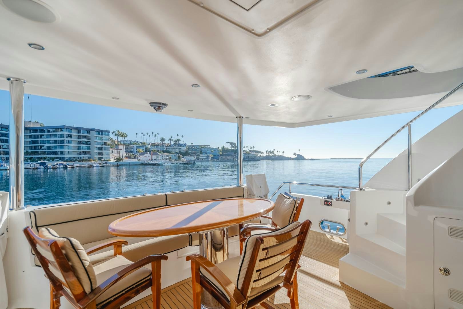 a table and chairs on a boat aboard OBSESSION Yacht for Sale