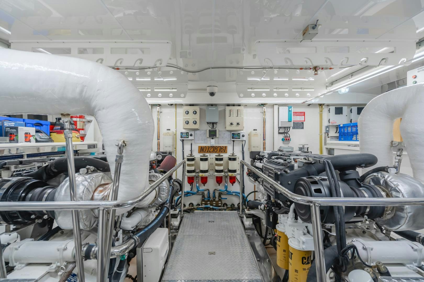a room with pipes and machinery aboard OBSESSION Yacht for Sale