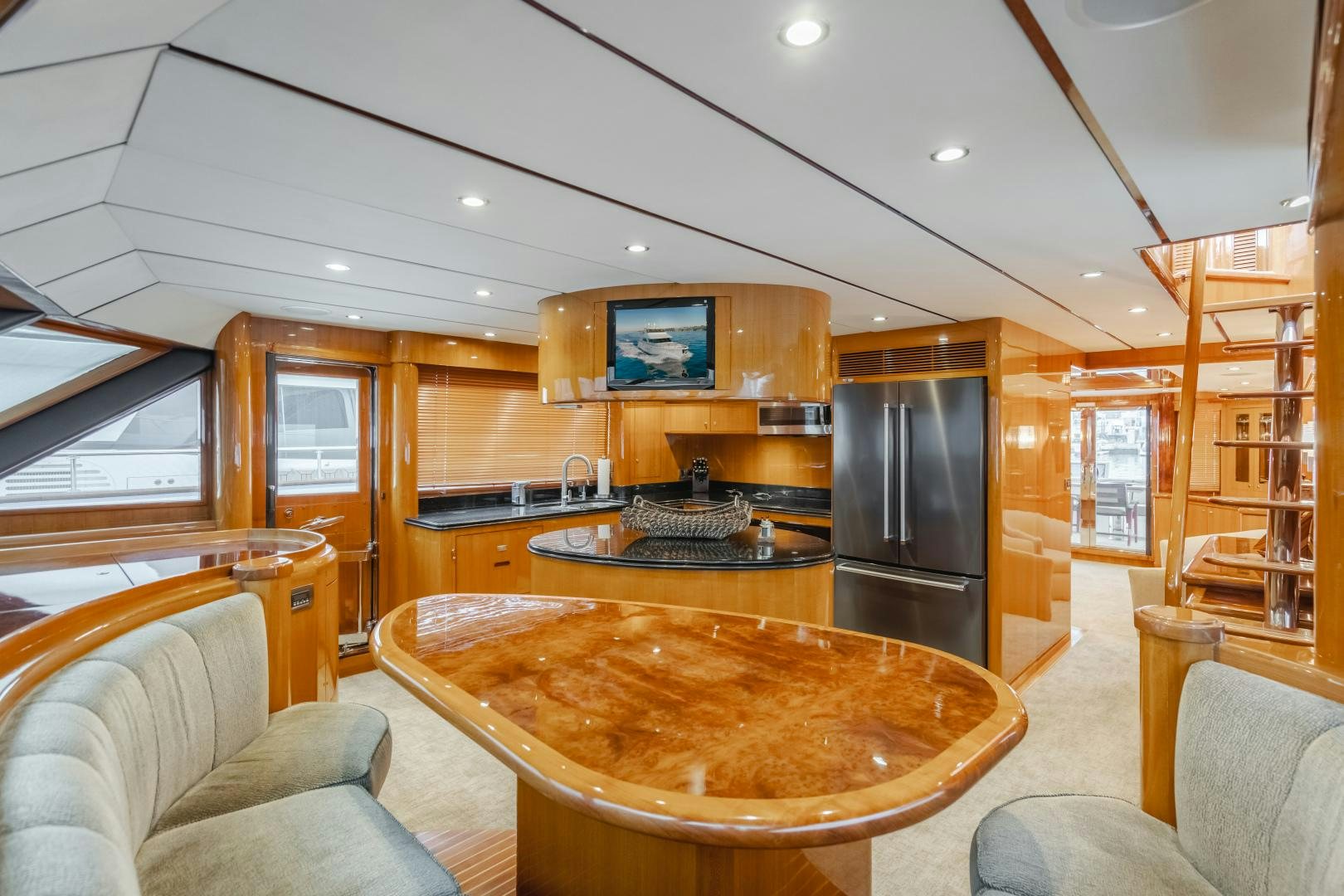 a kitchen with a large island aboard OBSESSION Yacht for Sale