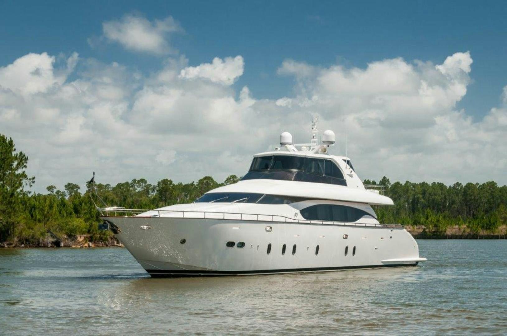 a white yacht in the water aboard NEVER REST Yacht for Sale