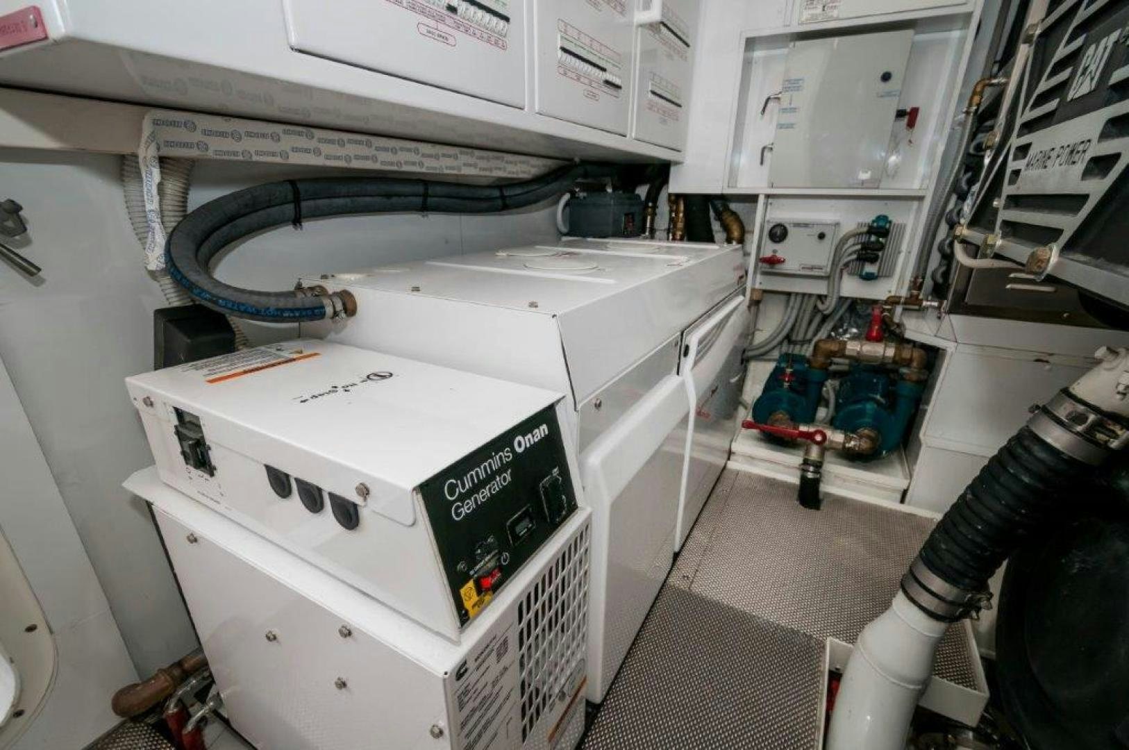 a white machine with a white panel aboard NEVER REST Yacht for Sale