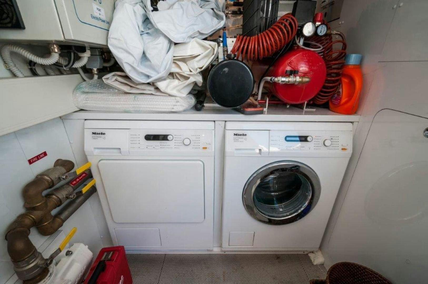 a white washing machine aboard NEVER REST Yacht for Sale