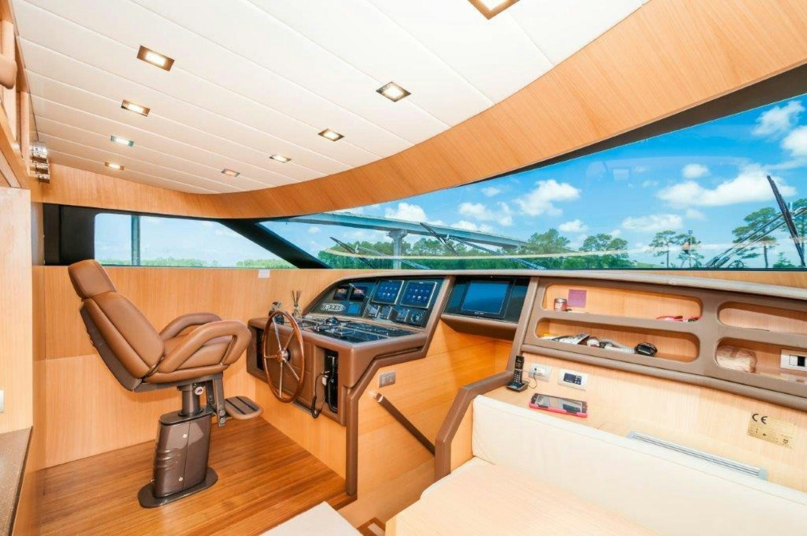 a room with a desk and a computer aboard NEVER REST Yacht for Sale