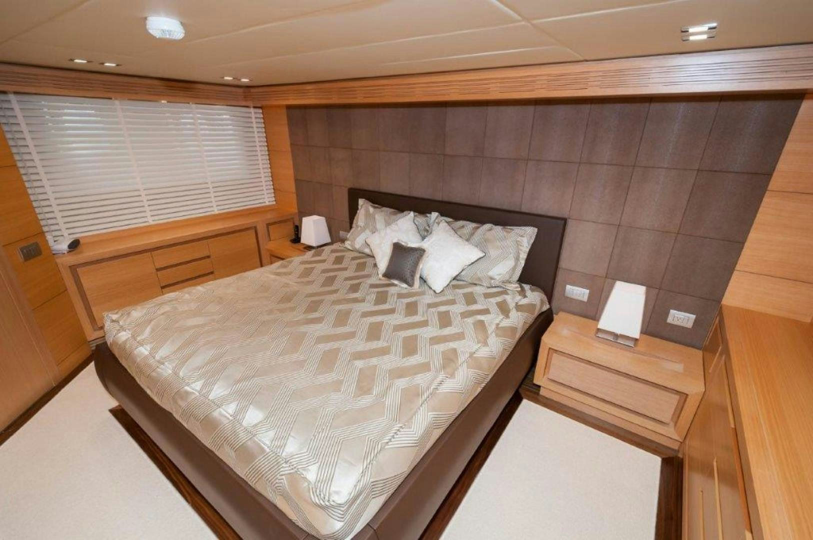 a bed in a room aboard NEVER REST Yacht for Sale