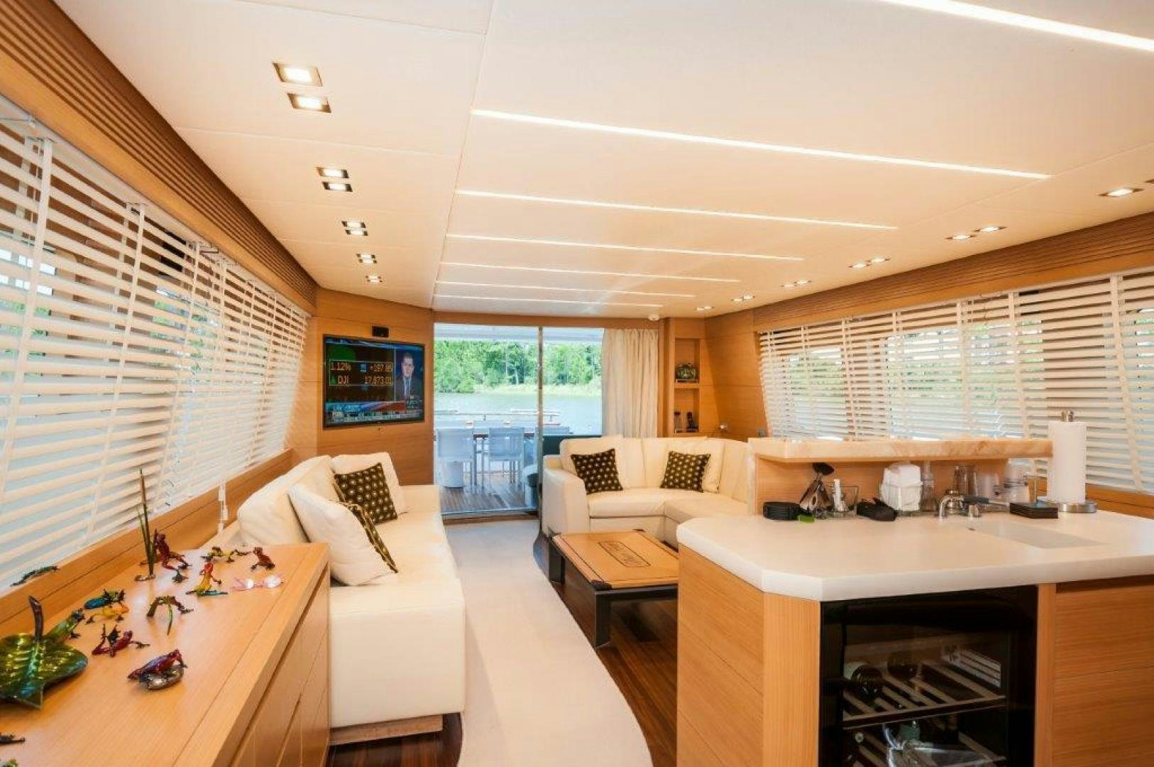 a room with a table and chairs aboard NEVER REST Yacht for Sale
