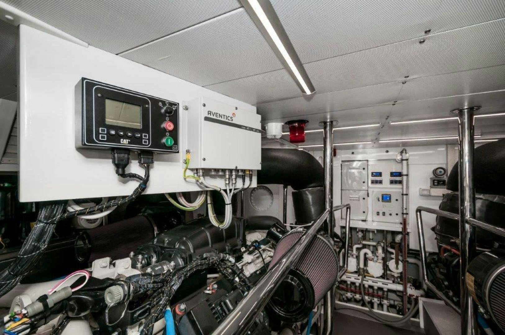 a computer monitor and other equipment in a room aboard NEVER REST Yacht for Sale