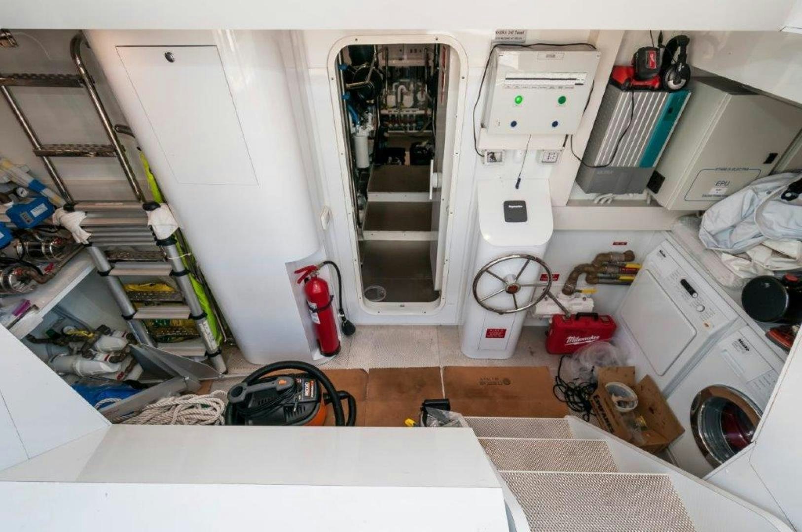 a white machine with a door open aboard NEVER REST Yacht for Sale