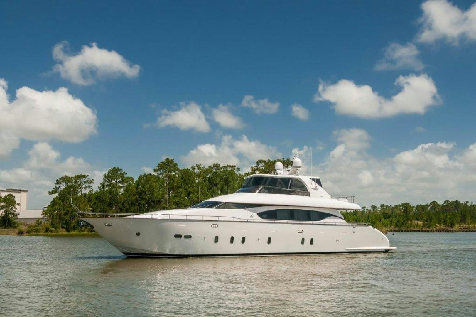 a white yacht on the water aboard NEVER REST Yacht for Sale