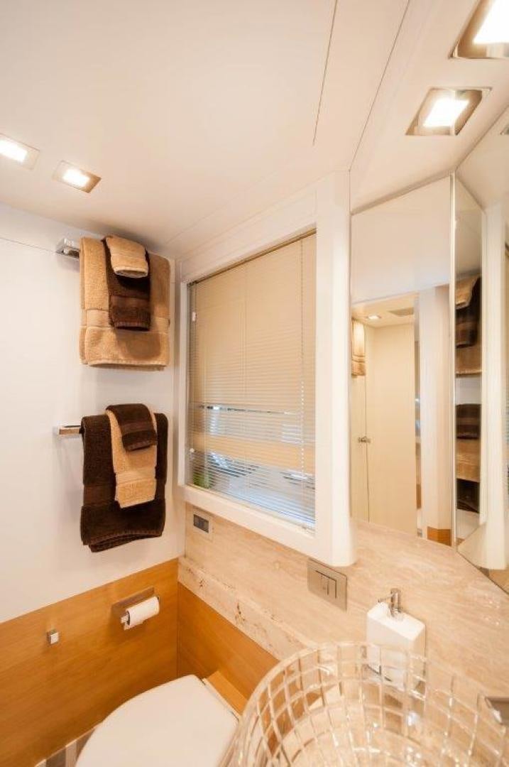 a bathroom with a towel on the wall aboard NEVER REST Yacht for Sale