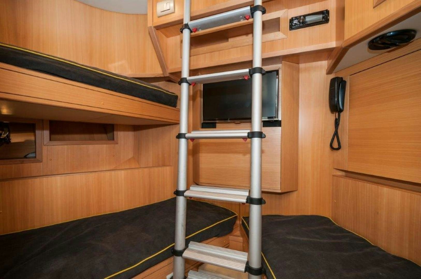 a ladder in a room aboard NEVER REST Yacht for Sale