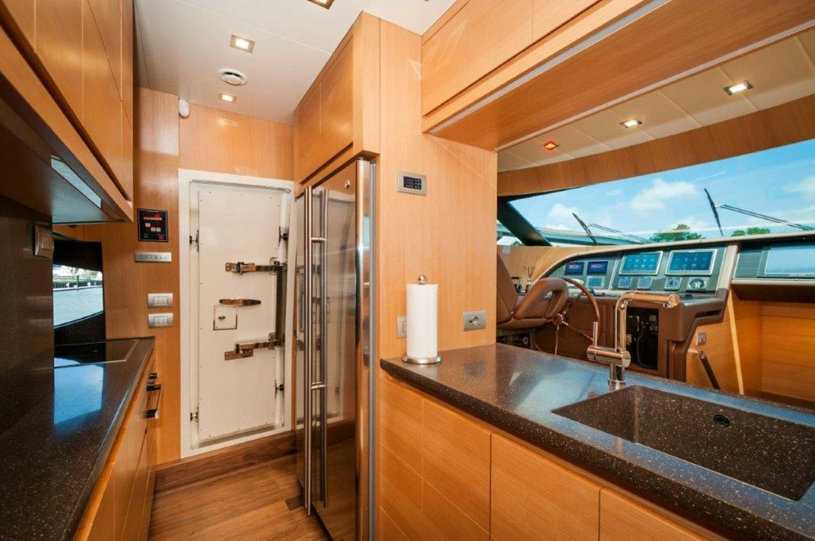 a kitchen with a large countertop aboard NEVER REST Yacht for Sale