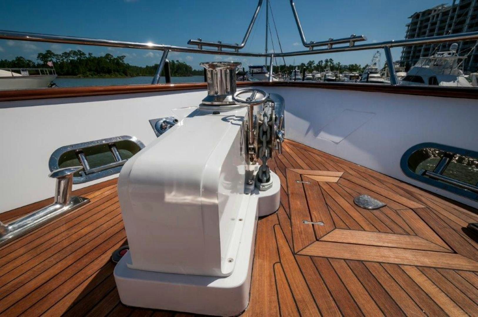 a white machine on a wooden deck aboard NEVER REST Yacht for Sale