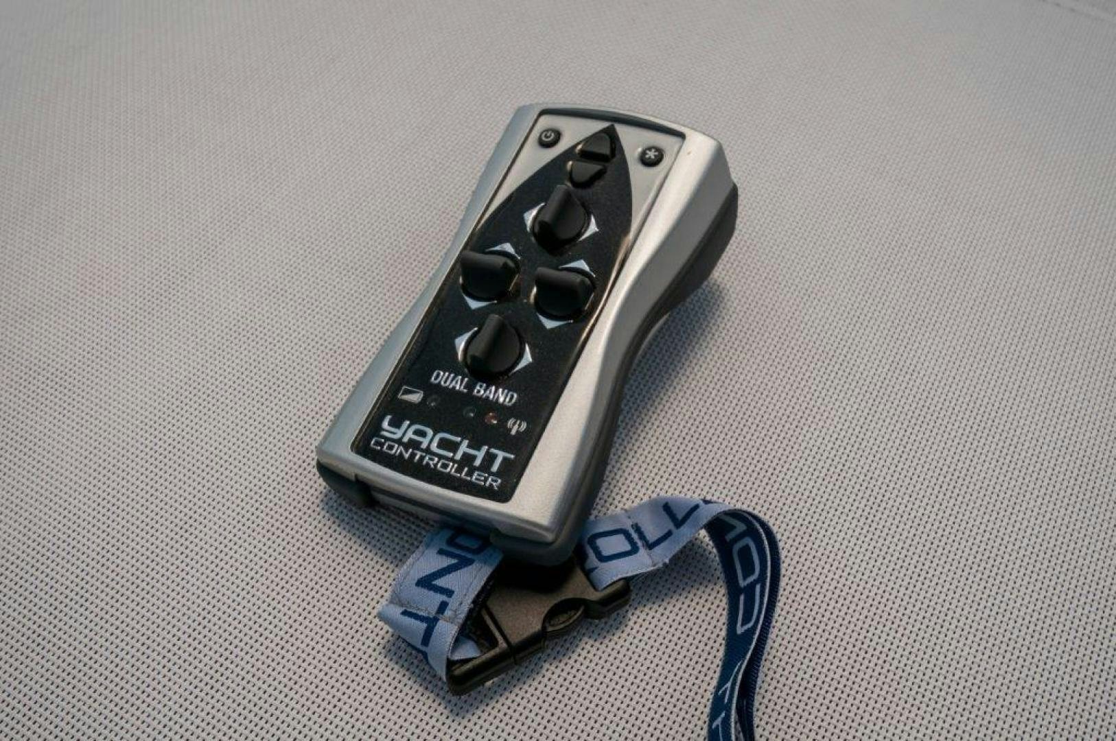 a black and silver keychain aboard NEVER REST Yacht for Sale