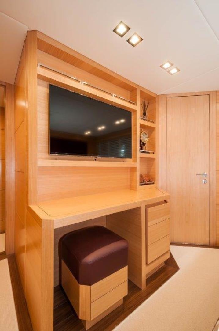 a tv on a shelf aboard NEVER REST Yacht for Sale