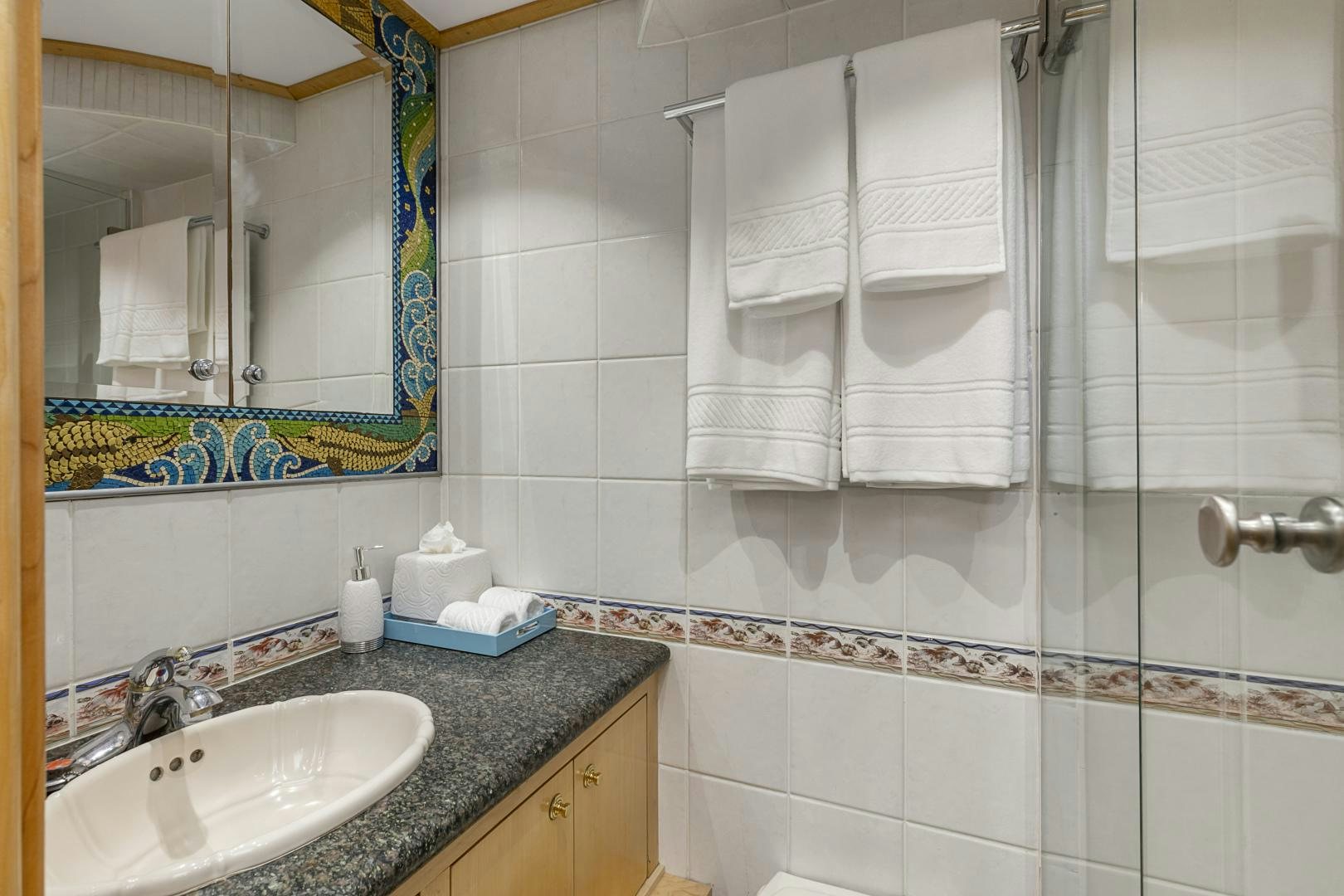 a bathroom with a sink and towels aboard HOLIDAY Yacht for Sale