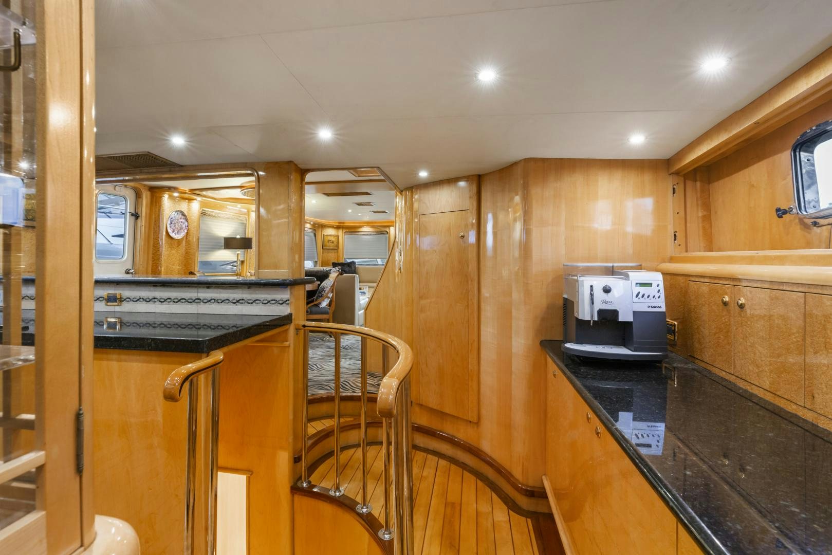 a kitchen with a microwave oven and a counter aboard HOLIDAY Yacht for Sale