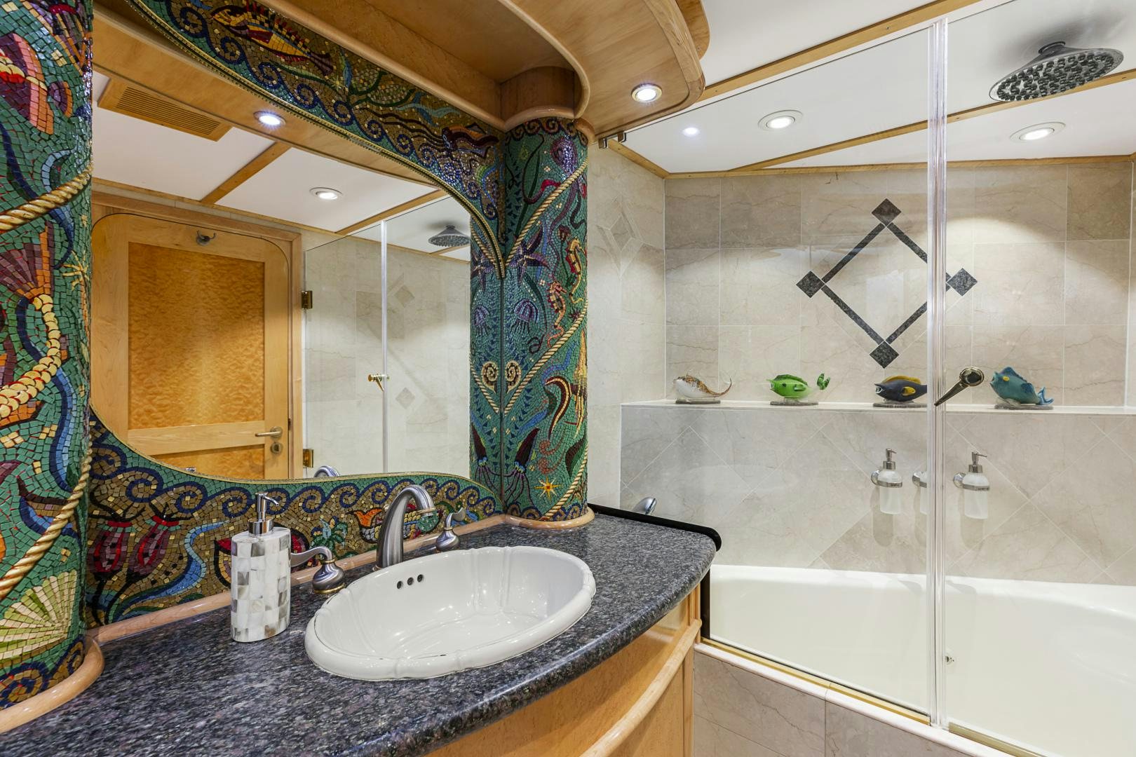 a bathroom with a marble counter top aboard HOLIDAY Yacht for Sale