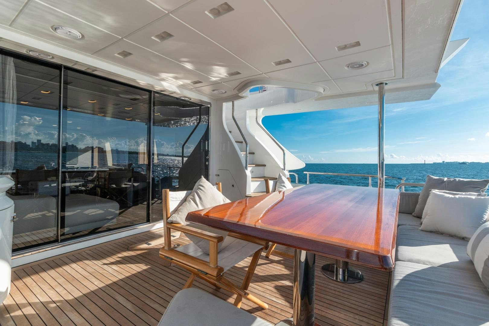 a boat with a deck and a view of the ocean aboard NO NAME Yacht for Sale
