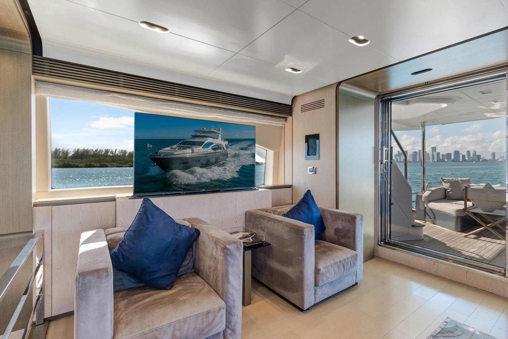 a living room with a large window aboard NO NAME Yacht for Sale