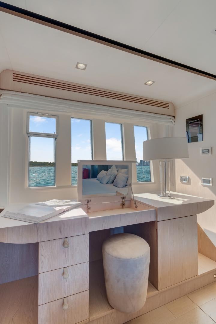 a room with a desk and a lamp aboard NO NAME Yacht for Sale