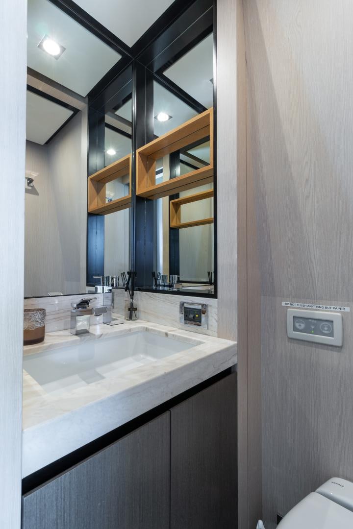 a bathroom with a sink and a mirror aboard NO NAME Yacht for Sale