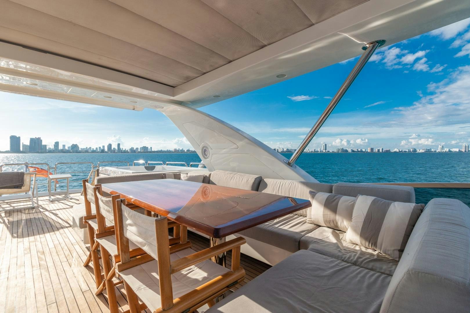a room with a bed and a view of a city aboard NO NAME Yacht for Sale
