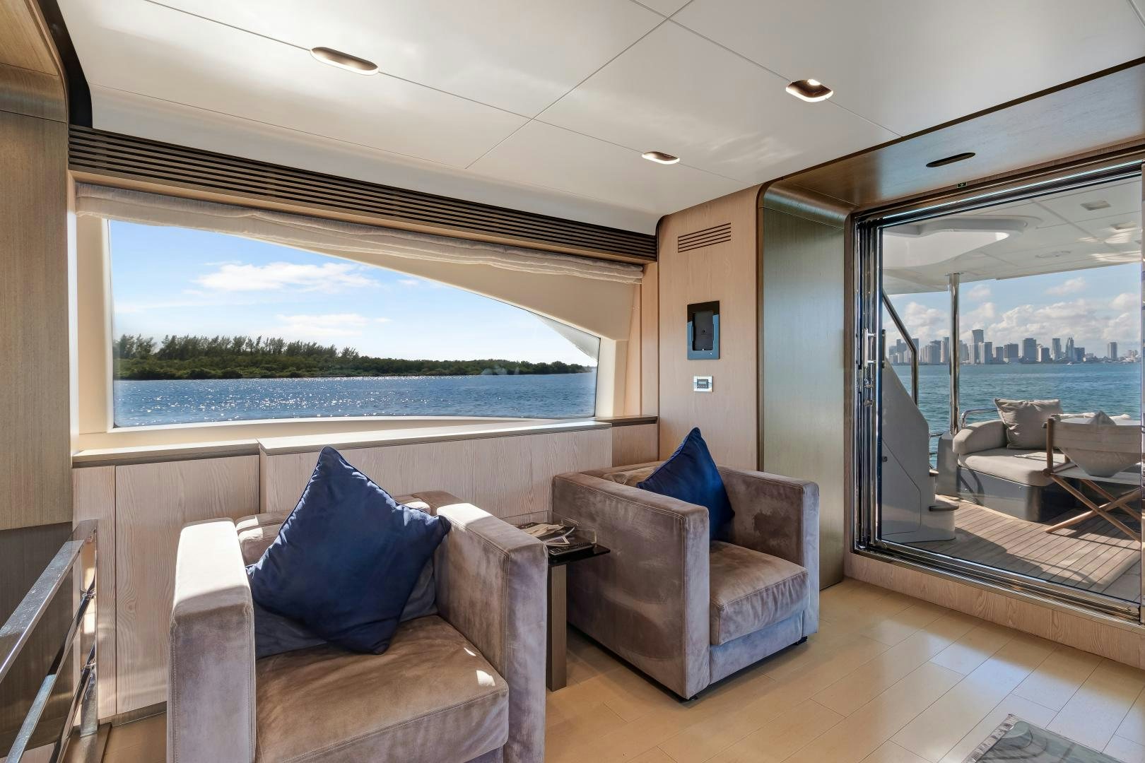 a living room with a large window aboard NO NAME Yacht for Sale