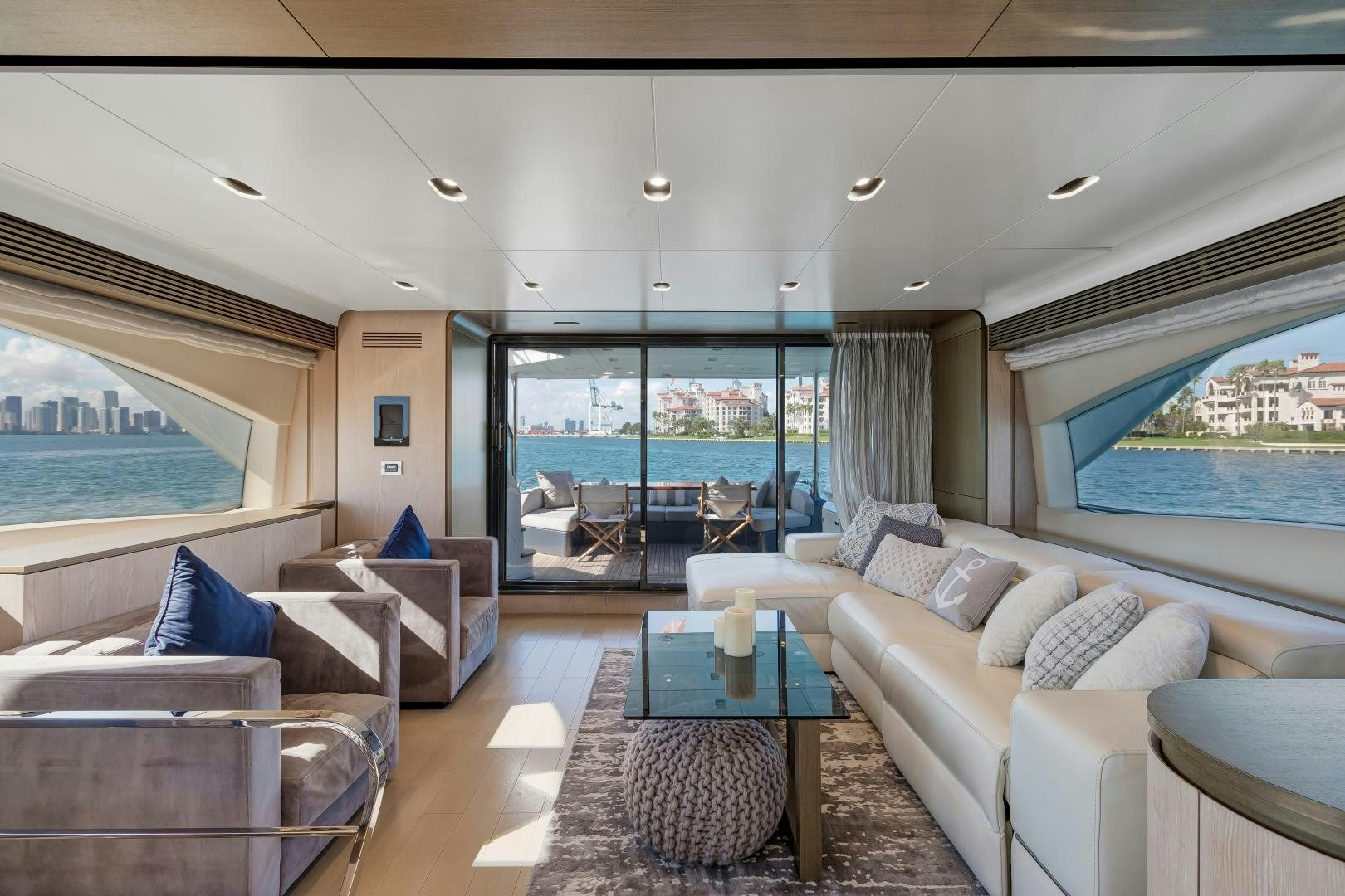 a living room with a large window aboard NO NAME Yacht for Sale