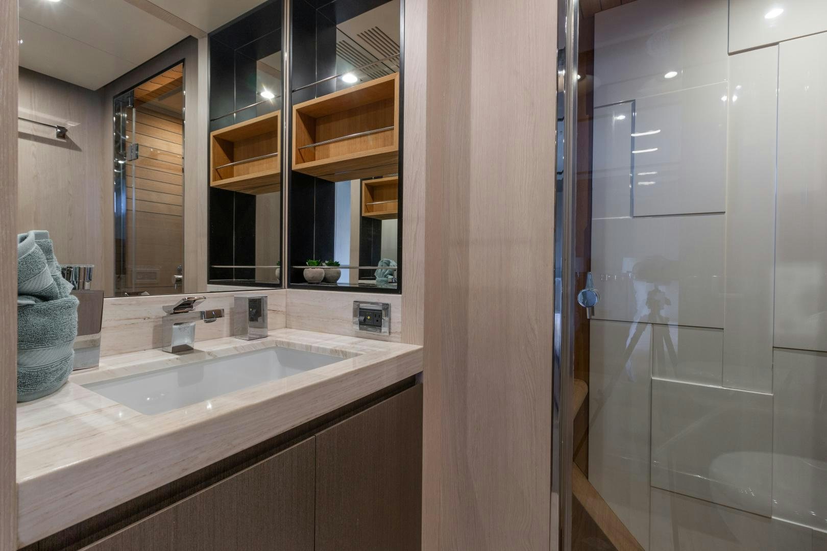 a bathroom with a sink and a mirror aboard NO NAME Yacht for Sale