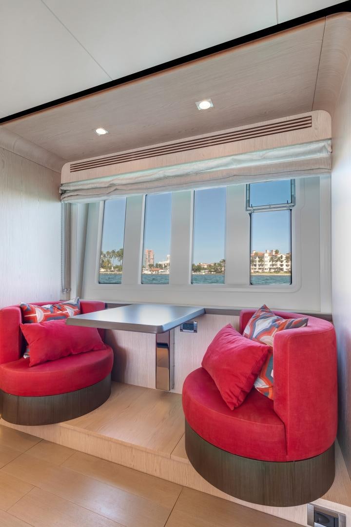 a room with a table and chairs aboard NO NAME Yacht for Sale