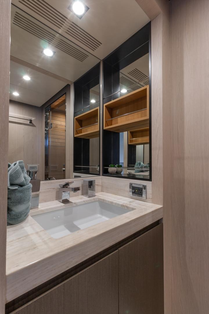 a bathroom with a large mirror aboard NO NAME Yacht for Sale