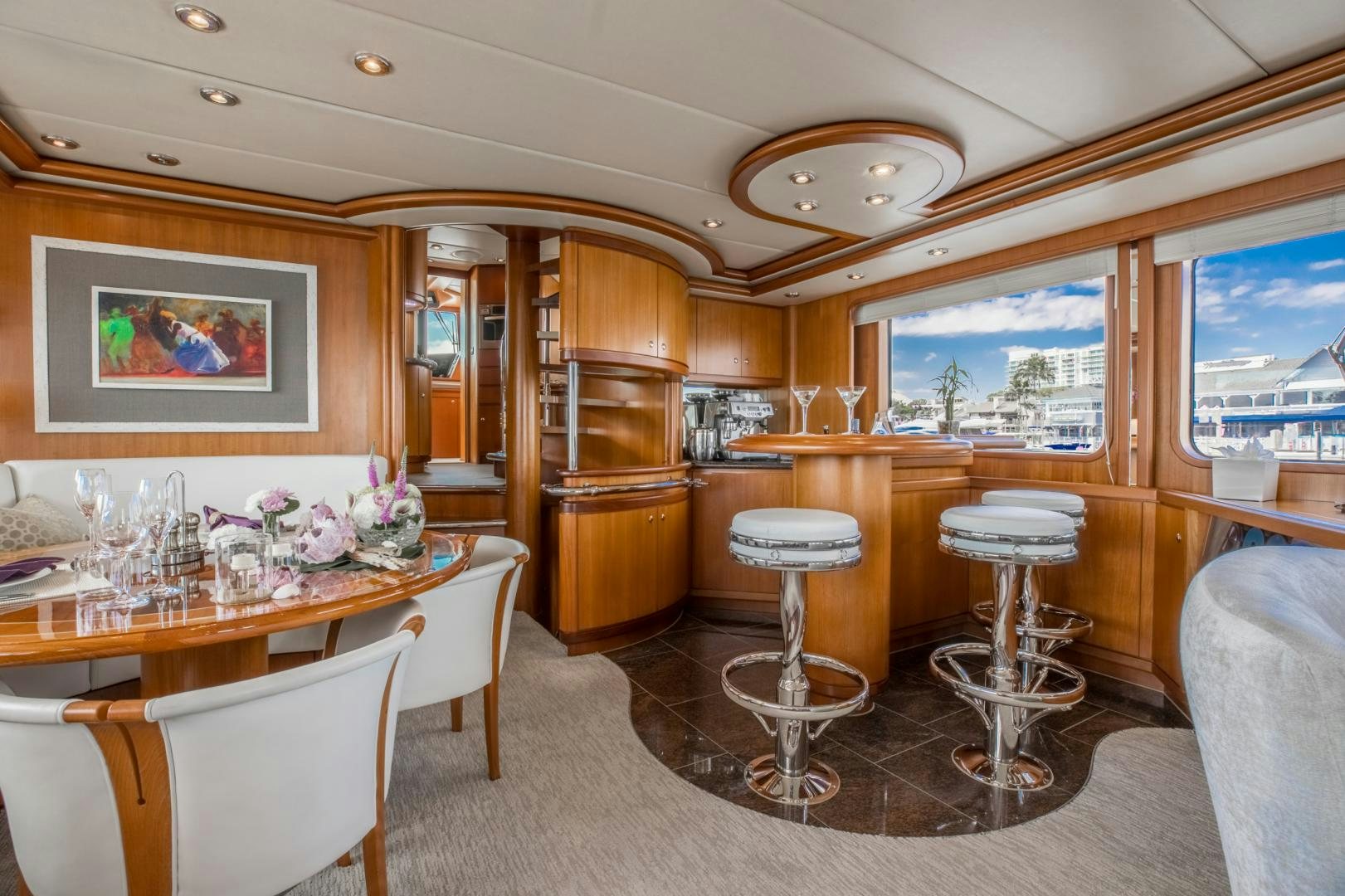 a room with a table and chairs aboard SLOW POKE Yacht for Sale