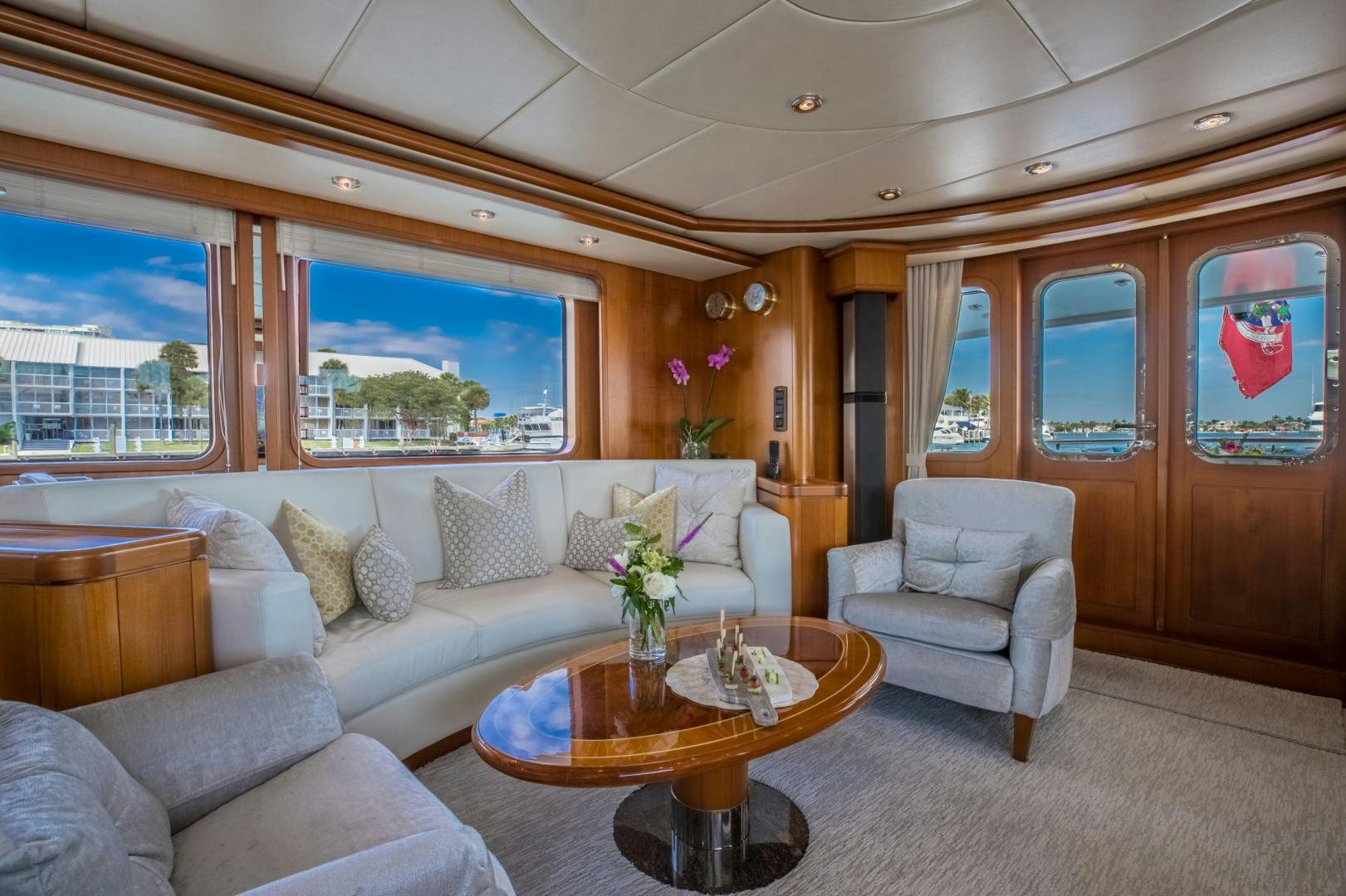 a living room with a couch and a table aboard SLOW POKE Yacht for Sale