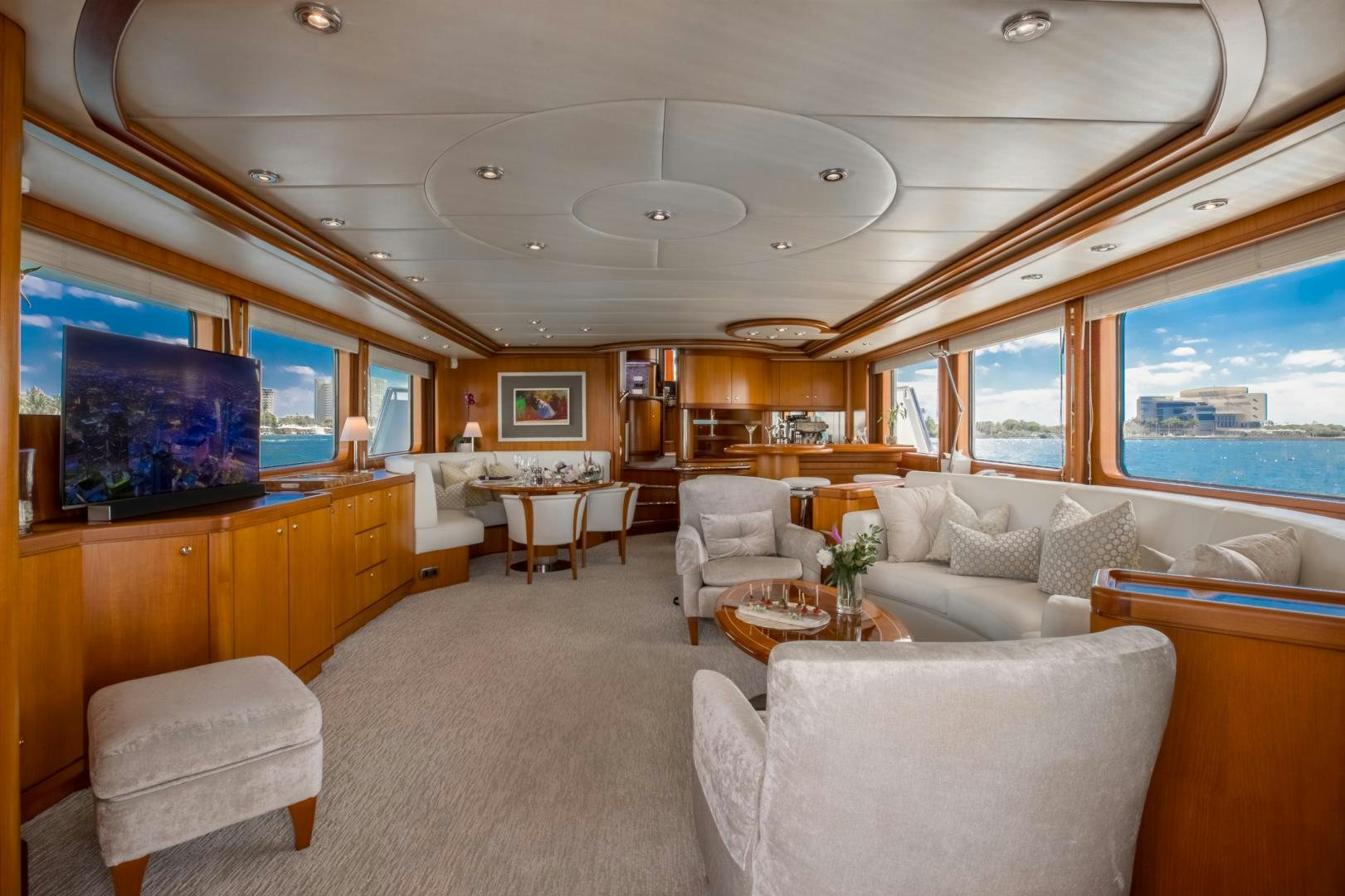 a living room with a large window aboard SLOW POKE Yacht for Sale